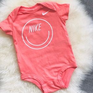 Nike - Coral Pink Onesie
